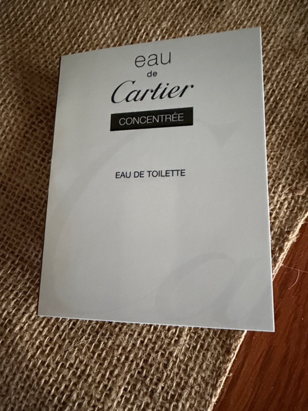 Cartier white and black Eau de Toilette sample card with 1.5 ml sample